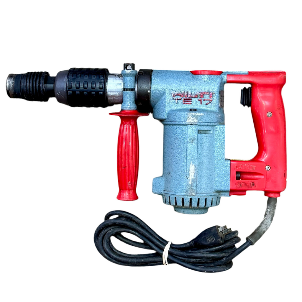 Black and red electric drill on a white background