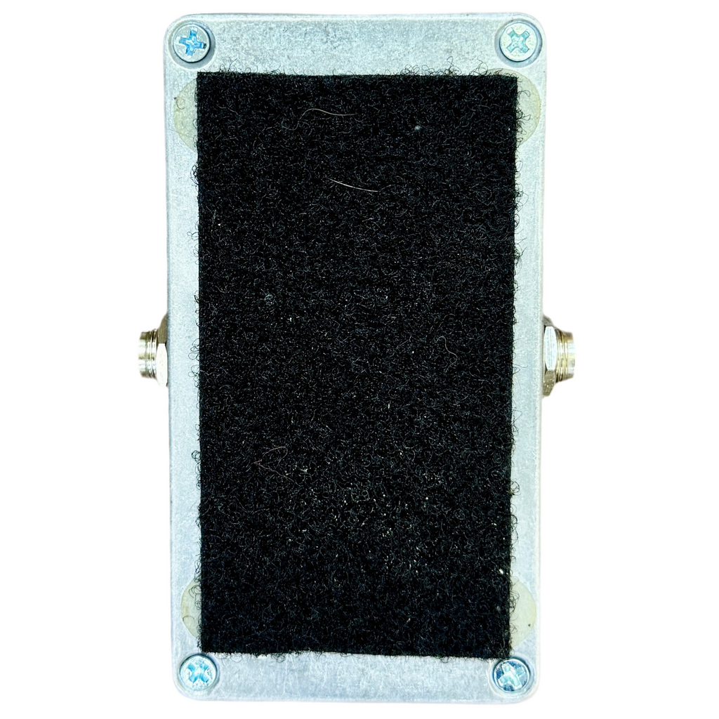 Electro-Harmonix Tone Corset Analog Compressor Guitar Effects Pedal Rectangular metal box with a black sponge-like filter on a white background