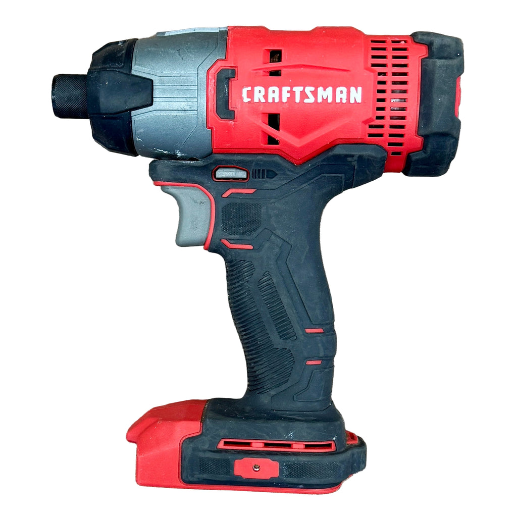 CRAFTSMAN V20 1/4" Cordless Variable Speed Impact Driver w/ Battery & Charger (CMCF800) Red and black Craftsman cordless drill on a wooden surface