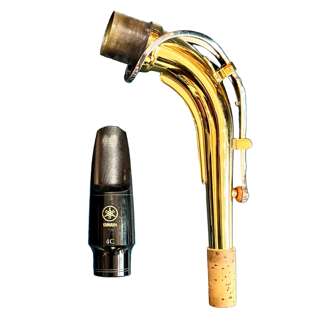 Yamaha YAS-26 Eb Alto Saxophone w/ Hard Case (Serial # R49086) Gold saxophone mouthpiece and black Yamaha mouthpiece on a blue surface