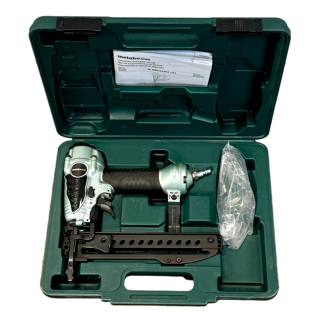 Metabo HPT 18-Gauge 1-1/2" Pneumatic Narrow Crown Stapler w/ Hard Case (N3804AB3S) Nail gun set in a green case on a white background