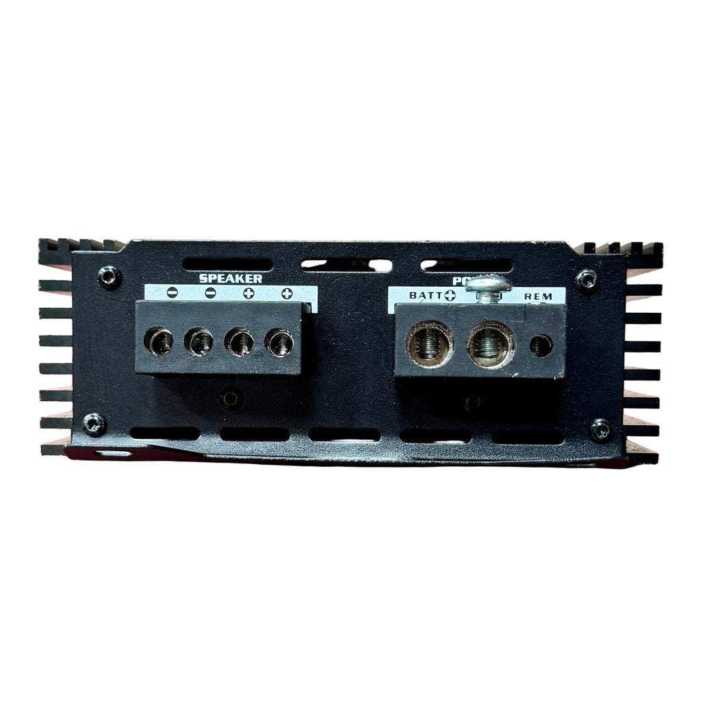 SKAR AUDIO RP-800.1D 800 Watt Class D Monoblock Car Amplifier Electronic module with speaker and power connectors on a white background