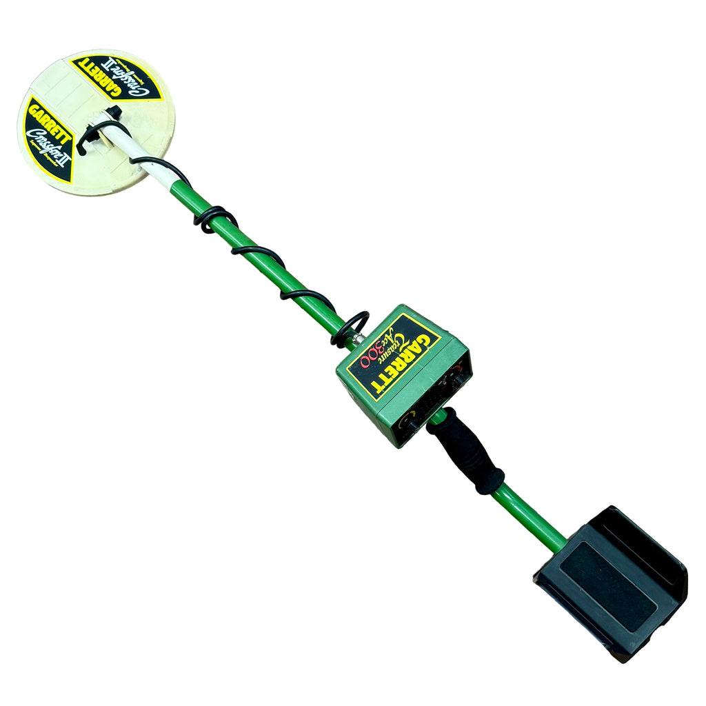 GARRETT Treasure Ace 300 Metal Detector Metal detector on a wooden floor