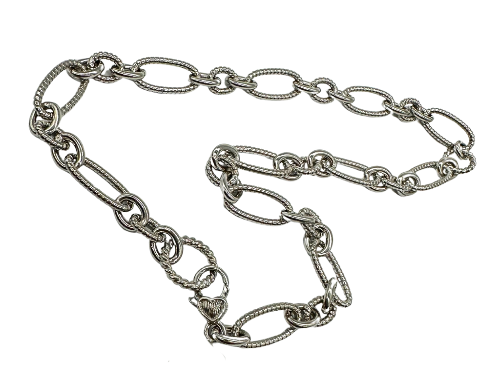 Silver chain necklace on a white background