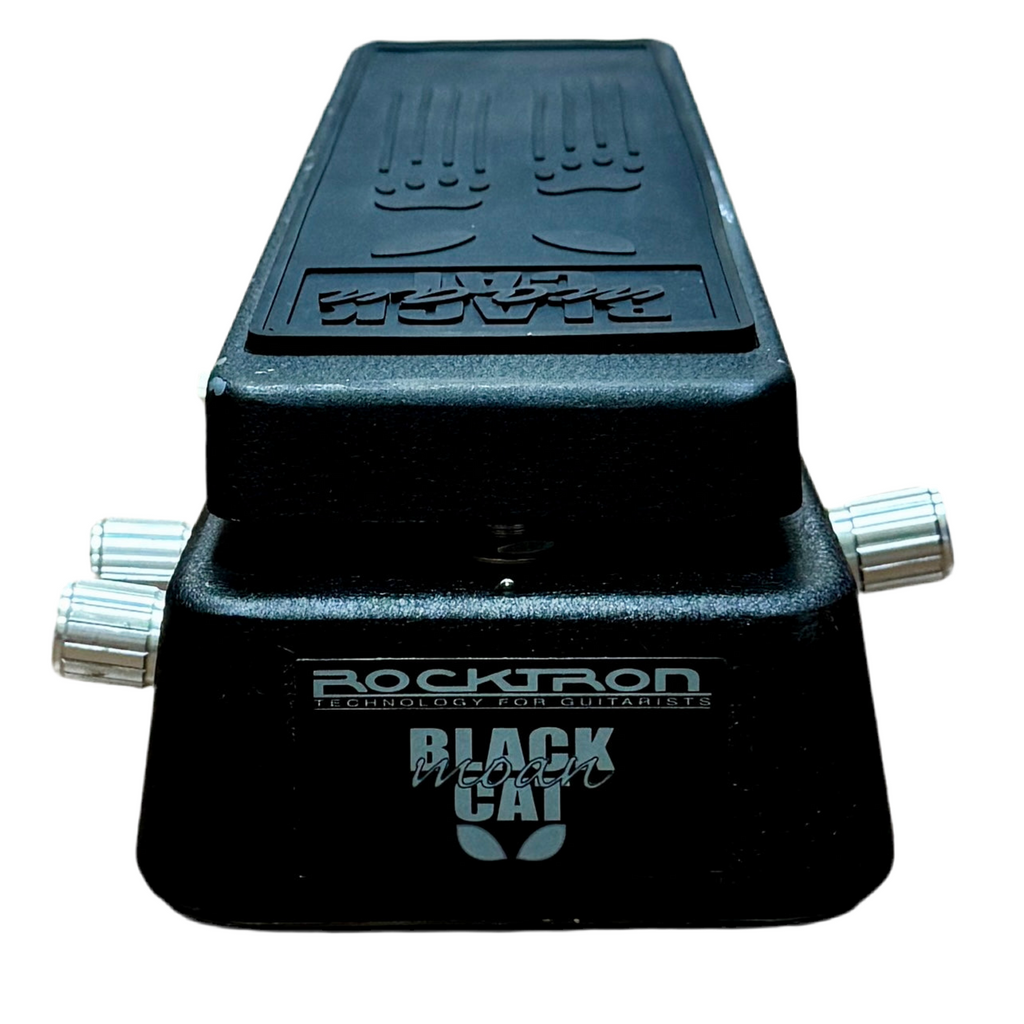Rocktron Black Cat Moan Wah Guitar Effects Pedal Black guitar effects pedal with 'Rocktron Black Cat' branding on a white background