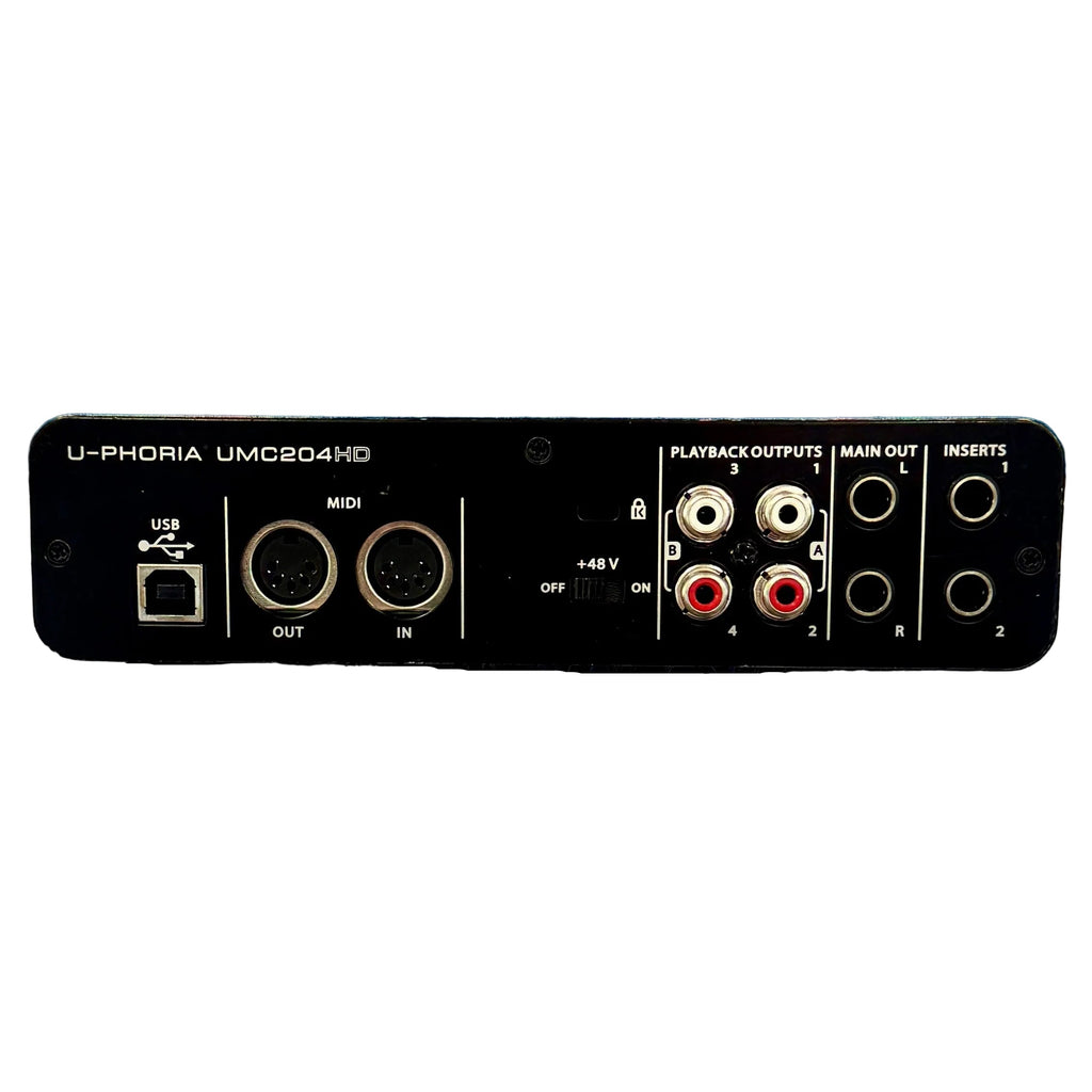 Behringer U-PHORIA UMC204HD USB Audio Interface Back panel of a U-PHORIA UMC204HD audio interface with various connectors on a white background.