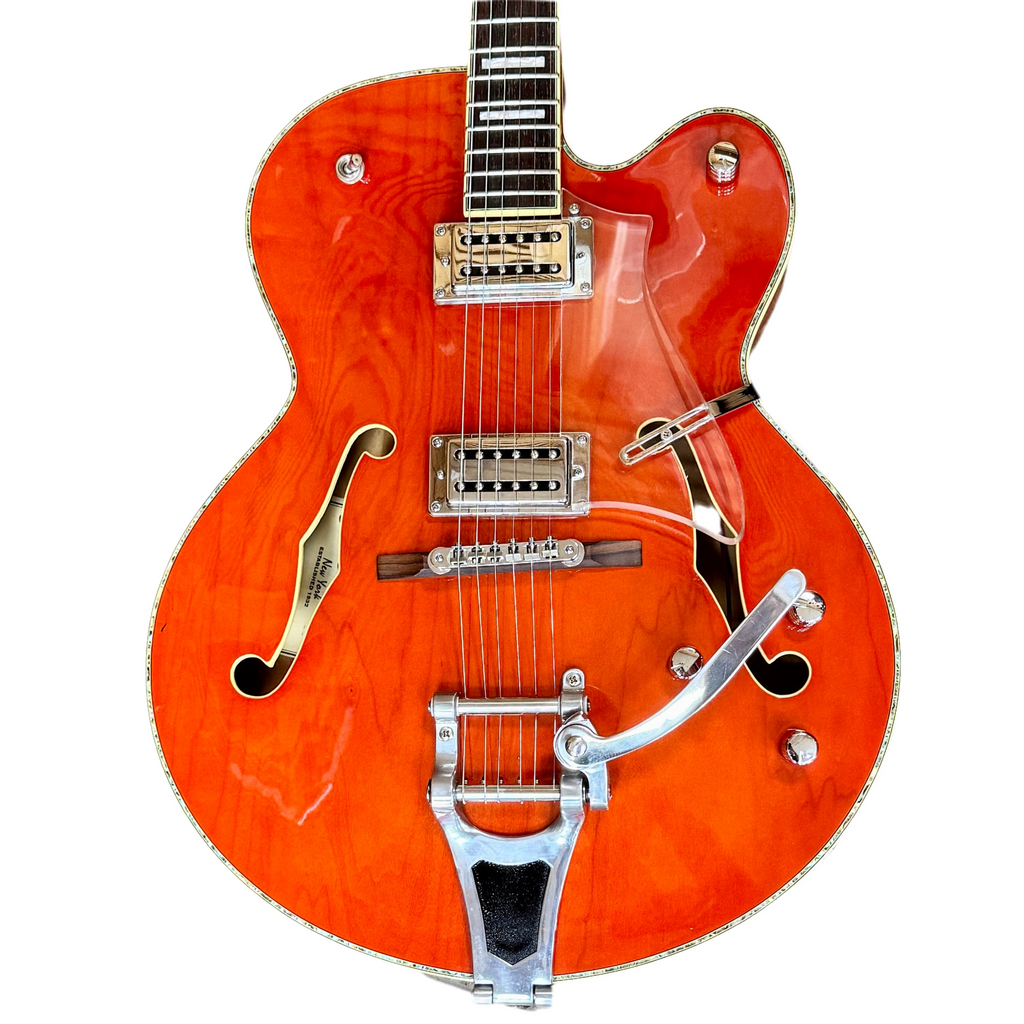 Carlo Robelli CRB1955 OR Hollow Body Electric Guitar Orange electric guitar with a white background