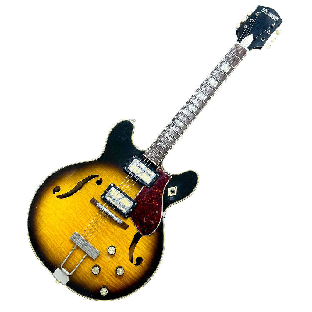 Vintage 1960's Harmony METEOR H60 Hollow Body Electric Guitar w/ Soft Case Electric guitar with a sunburst finish on a white background