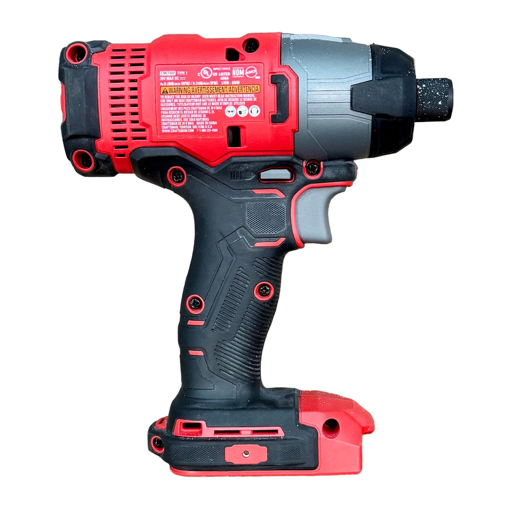 CRAFTSMAN V20 1/4" Cordless Variable Speed Impact Driver (CMCF800) Red and black cordless drill on a wooden surface