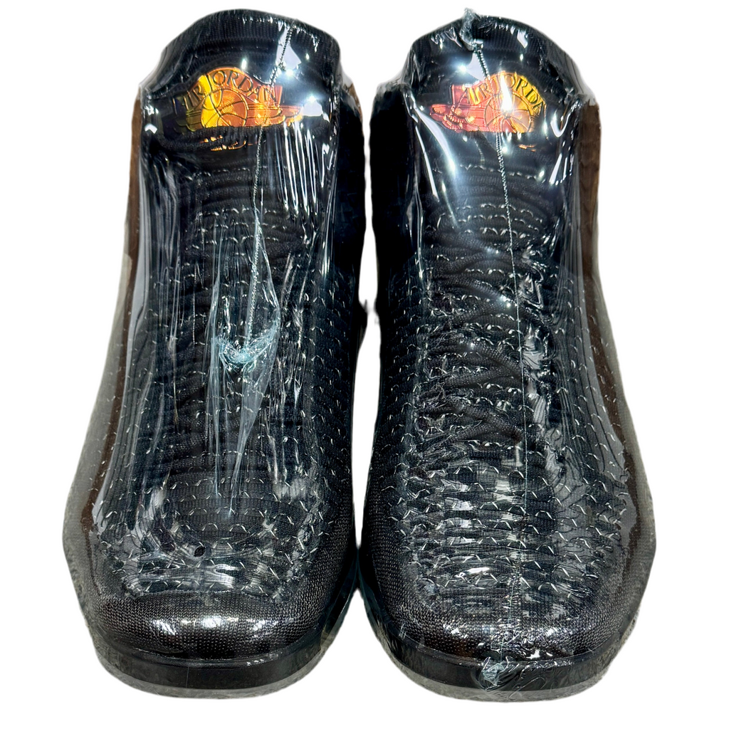 Jordan XXXII - Black Cat (Size 13) Black high-top sneakers with clear plastic wrap on a white background