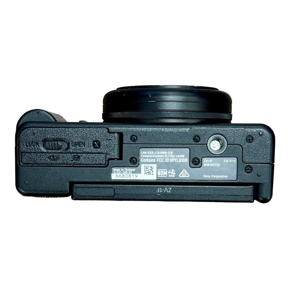 Sony ZV-1F Vlog Camera for Content Creators and Vloggers - Black Back view of a black camera on a wooden surface