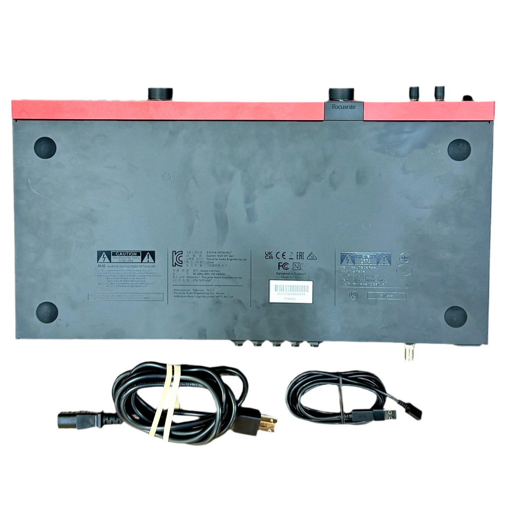 Focusrite Scarlett 18i20 USB Audio Interface - 4th Generation Battery pack with cables on a white background