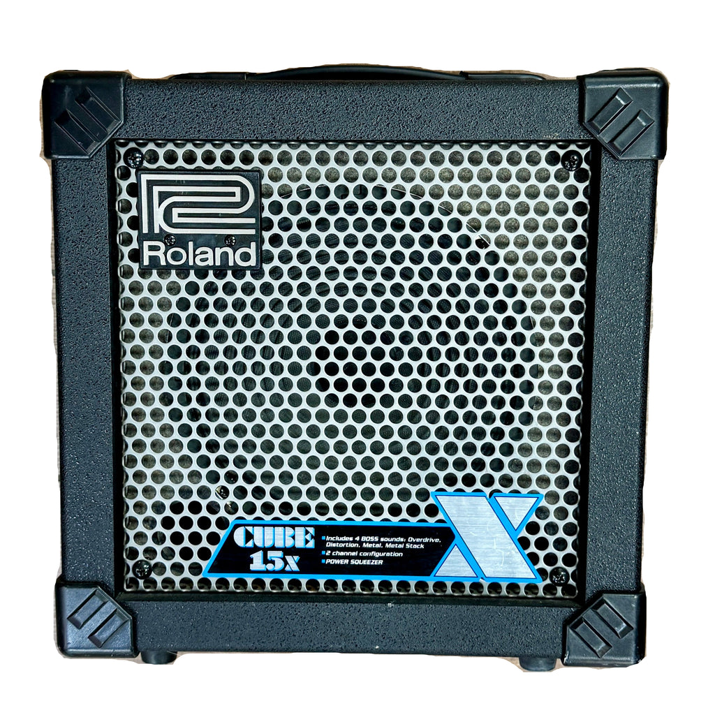 Roland CUBE-15X Guitar Combo Amplifier Roland Cube 15x guitar amplifier on a wooden surface