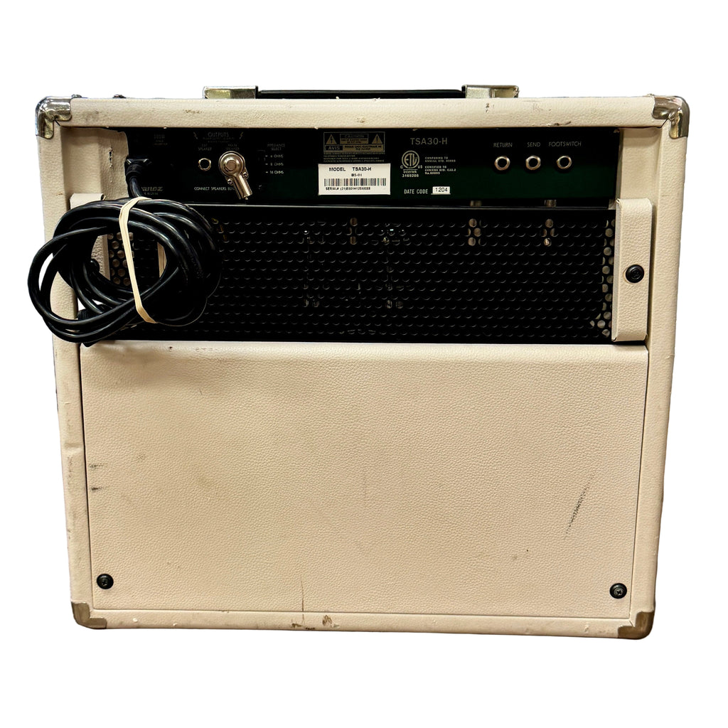 Ibanez TSA30-H Guitar Combo Amplifier Vintage guitar amplifier with a power cord on a metallic background