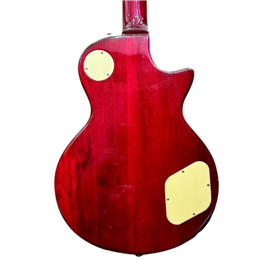 Samick Artist Series Edition Les Paul Style Left-Handed Electric Guitar Red electric guitar body with gold hardware on a white background