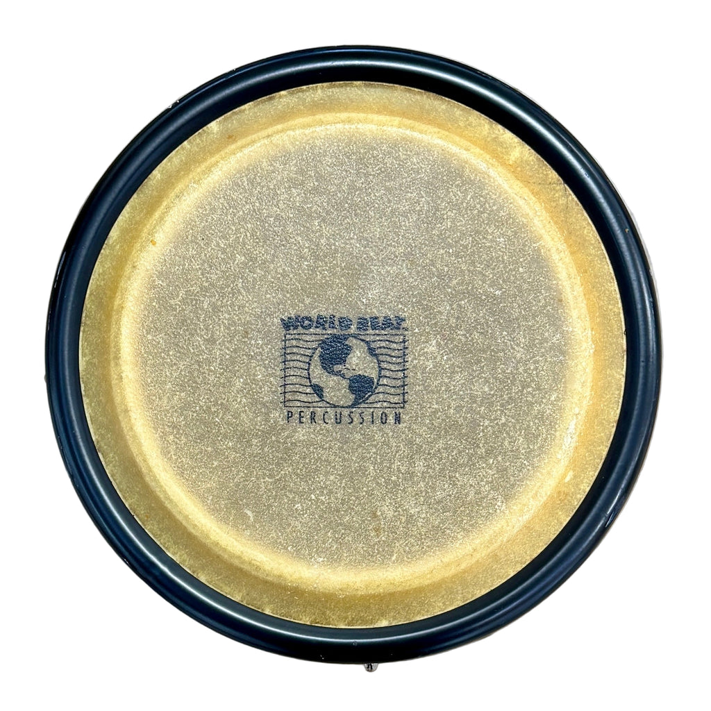LP Latin Percussion 9" World Beat Caribe Conga Drum head with a logo on a wooden floor