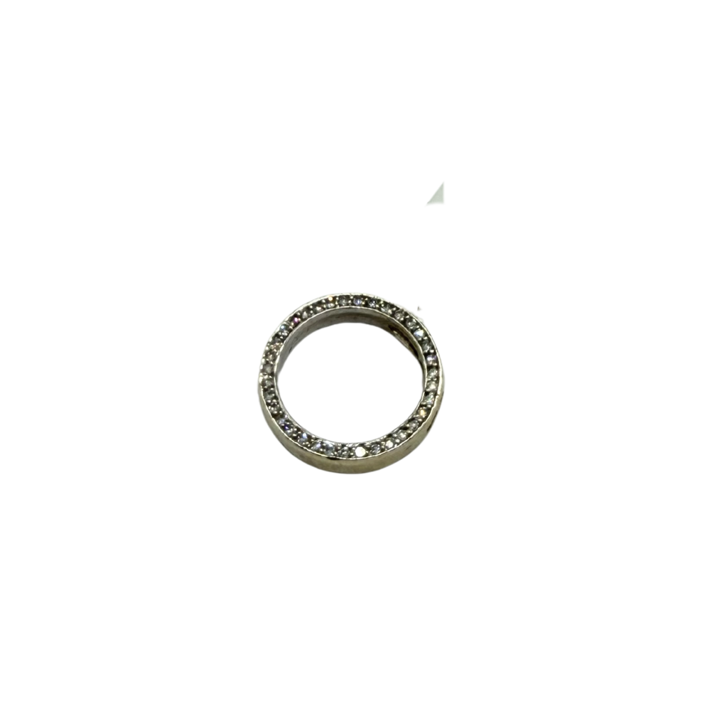 Silver ring with small stones on a white background