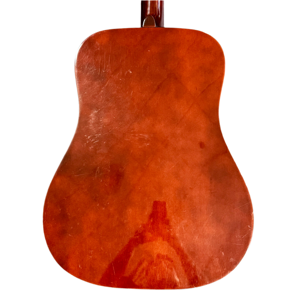 Aria A-690 Acoustic Guitar w/ Soft Case Back of a wooden acoustic guitar on a white background