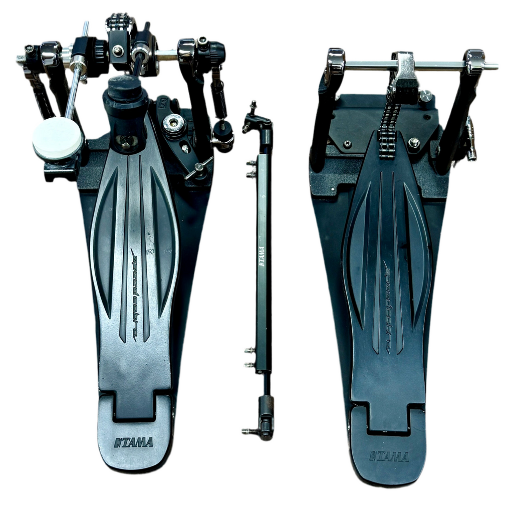 TAMA Speed Cobra 910 Double Bass Drum Pedal w/ Hard Case (HP910LWN) Pair of drum pedals with Tama branding on a white background