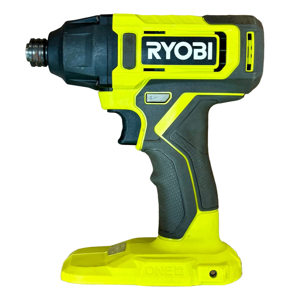 RYOBI ONE+ 18V 1/4" Cordless Impact Driver w/ Battery (PCL235) Ryobi cordless drill on a wooden surface