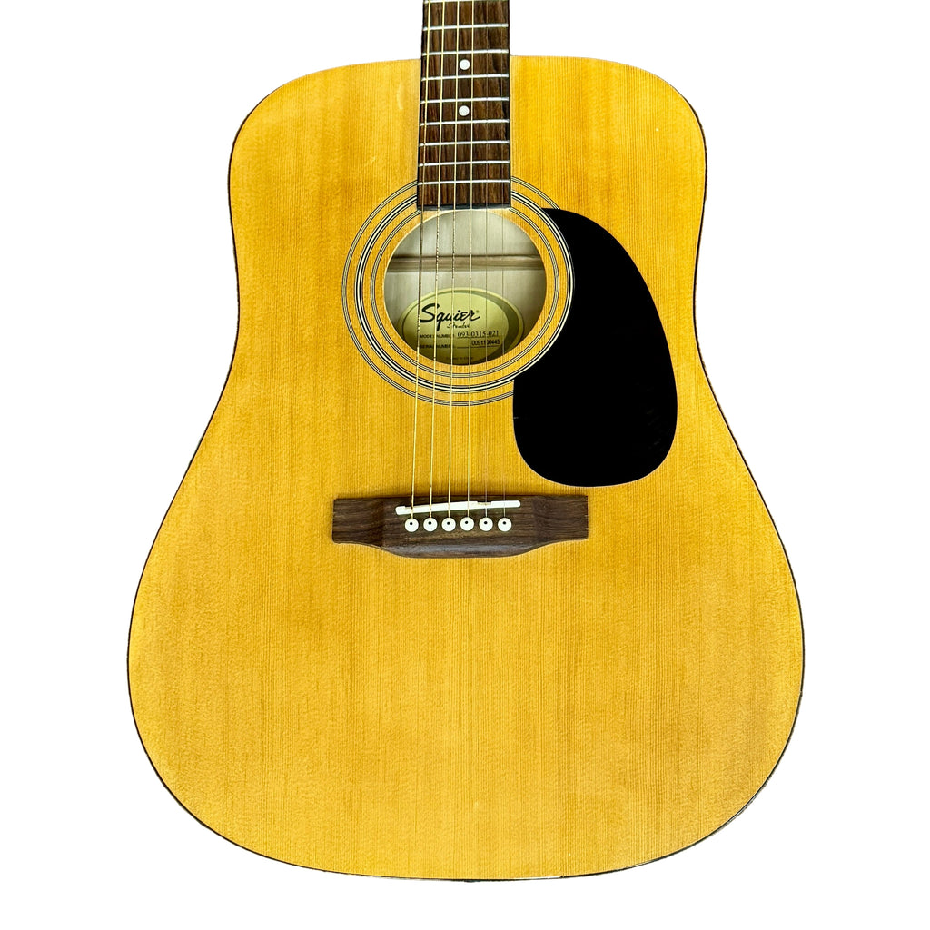 Fender Squier 093-0315-021 Acoustic Guitar Acoustic guitar with a visible brand logo on a wooden floor.