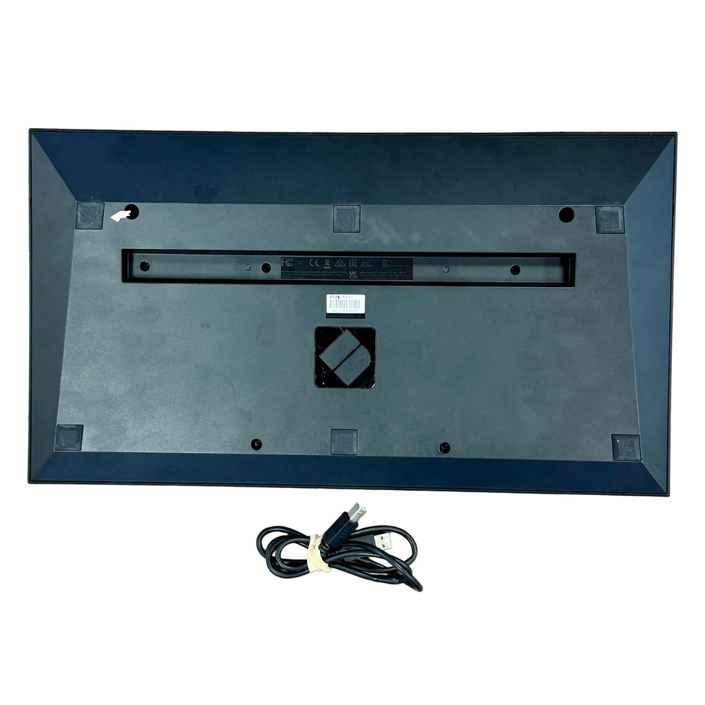 Novation LAUNCHKEY 25 MK3 25-Key MIDI Keyboard Controller Back view of a flat-screen TV with cables on a white background