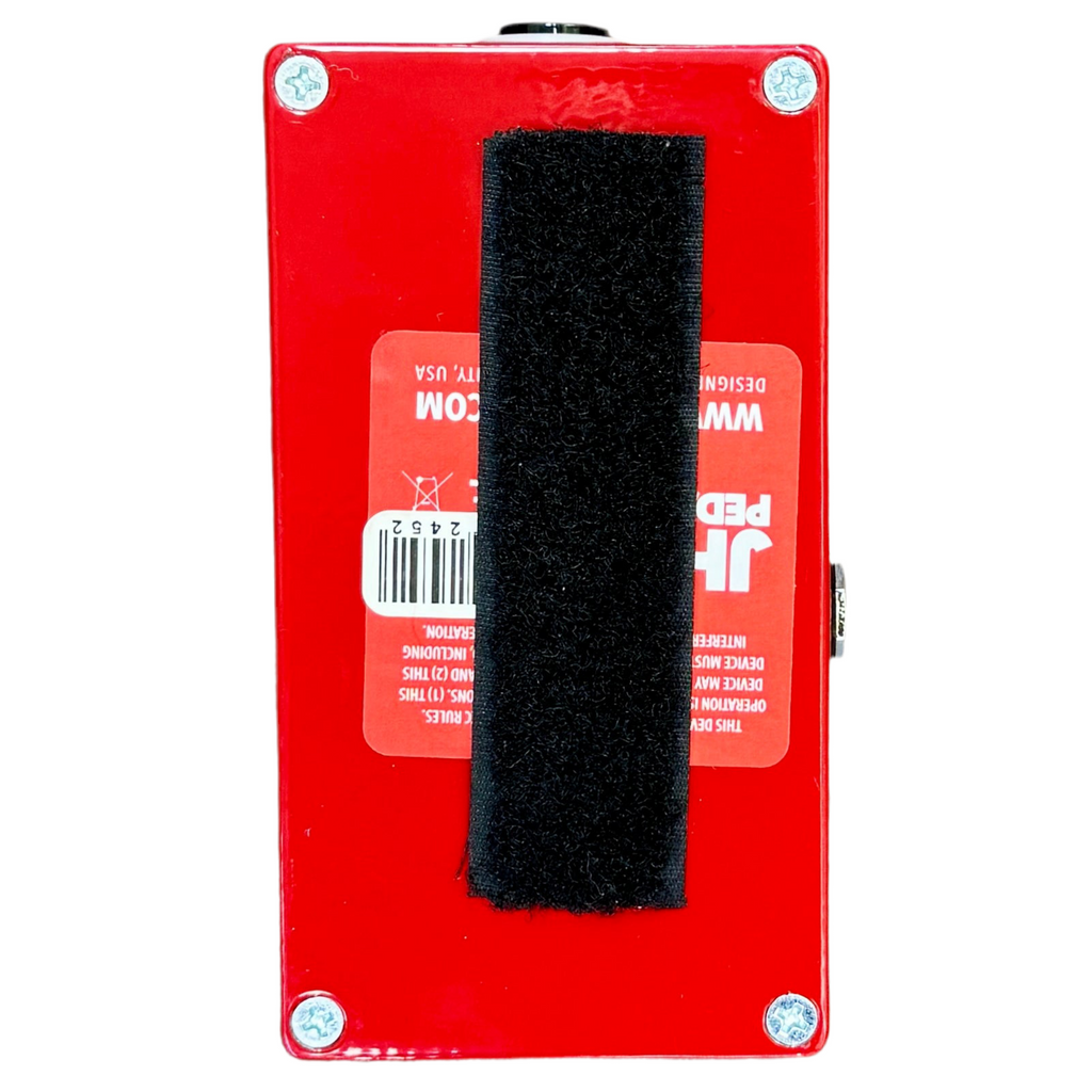 JHS Pedals THE AT+ Andy Timmons Signature Overdrive Guitar Effects Pedal Red guitar pedal with black foam grip on a white background