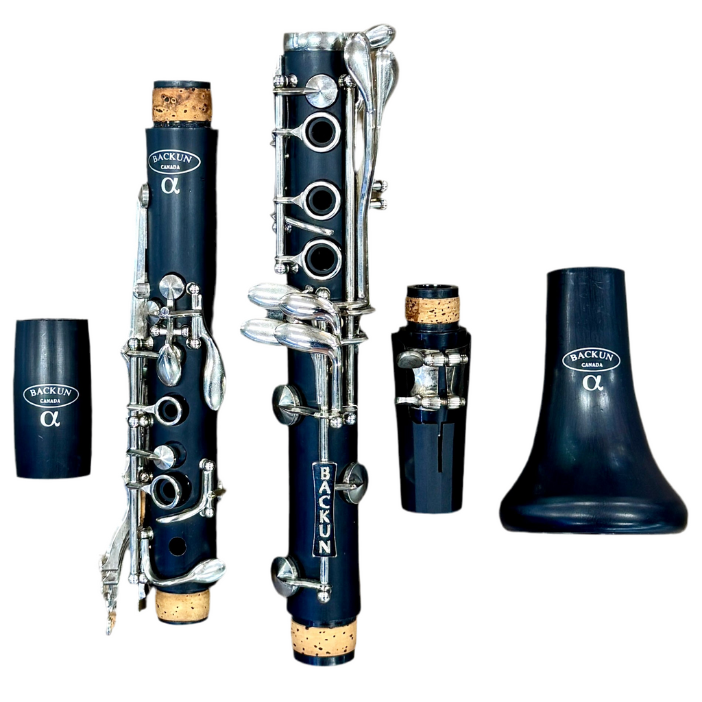 BACKUN Alpha Bb Student Clarinet w/ Hard Case Backun clarinet set with various parts on a white background
