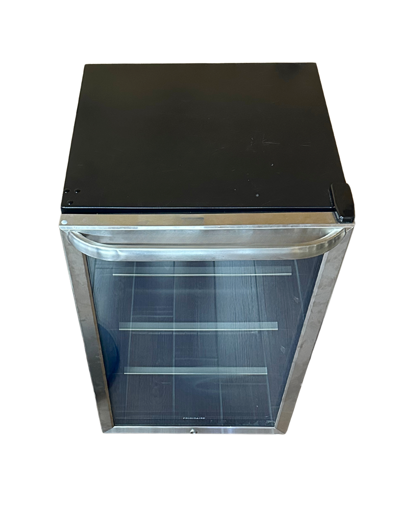 Small refrigerator with glass door on a white background