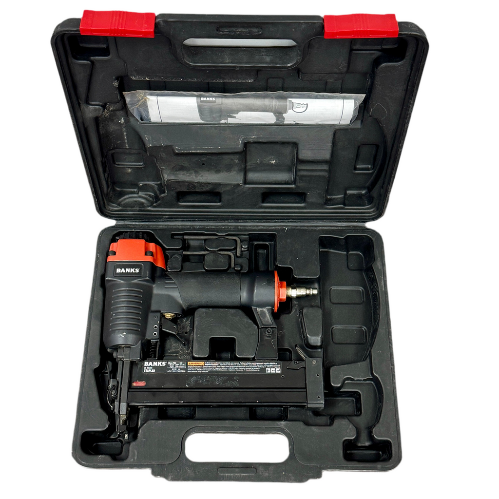 Black and red banks crown stapler tool set in an open black case on a white background