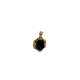 Gold pendant with a black stone on a white background