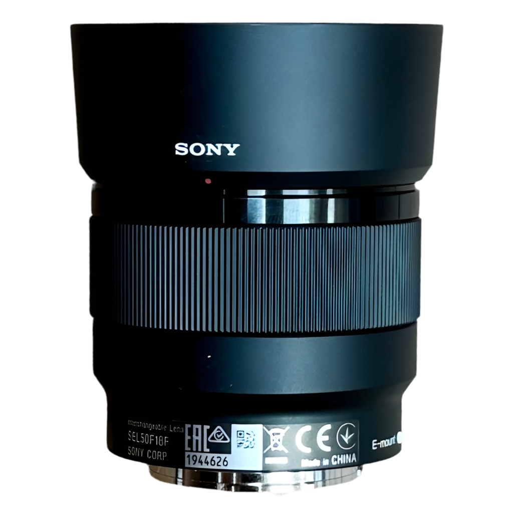 Sony FE 50mm f/1.8 Full-Frame Standard Prime Camera Lens w/ Hood & Caps (SEL50F18F) Sony camera lens on a white background