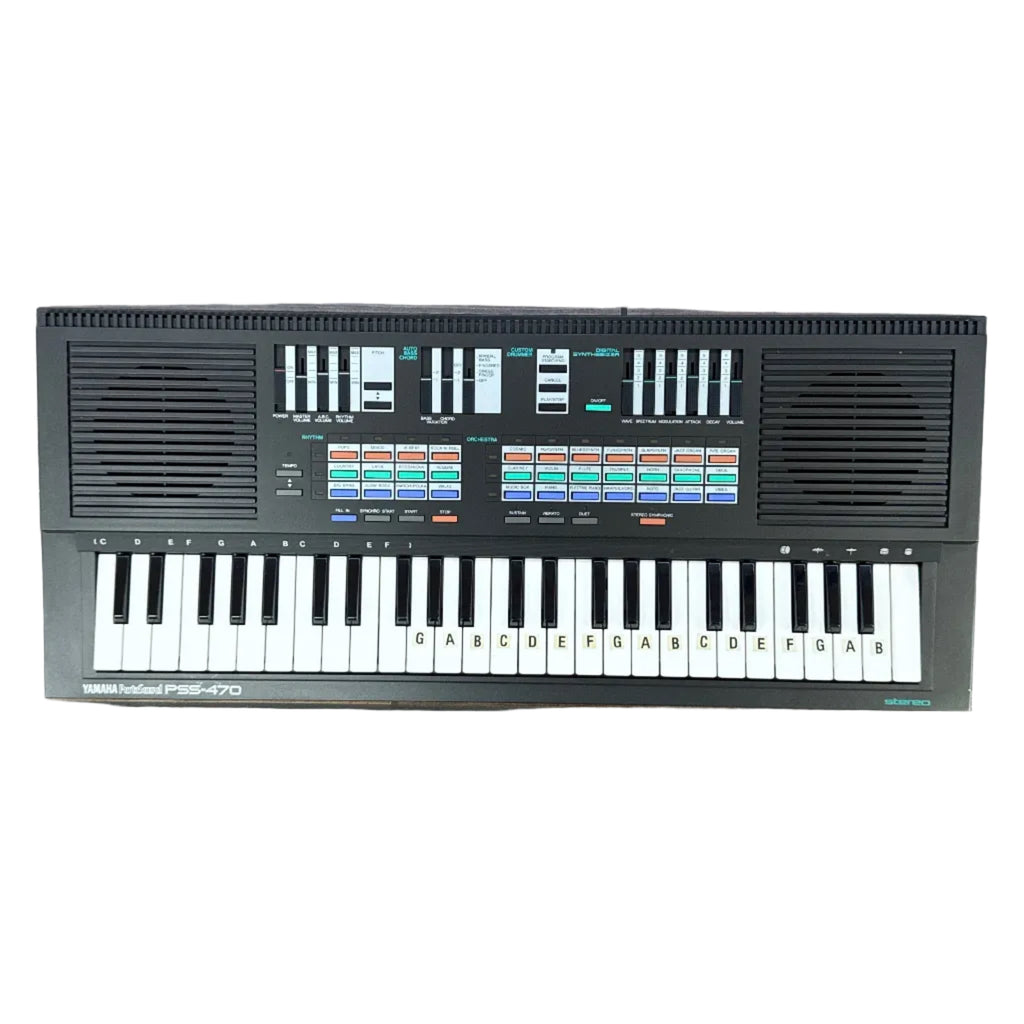 Yamaha PortaSound PSS-470 49-Key Digital Synthesizer Keyboard on a wooden floor
