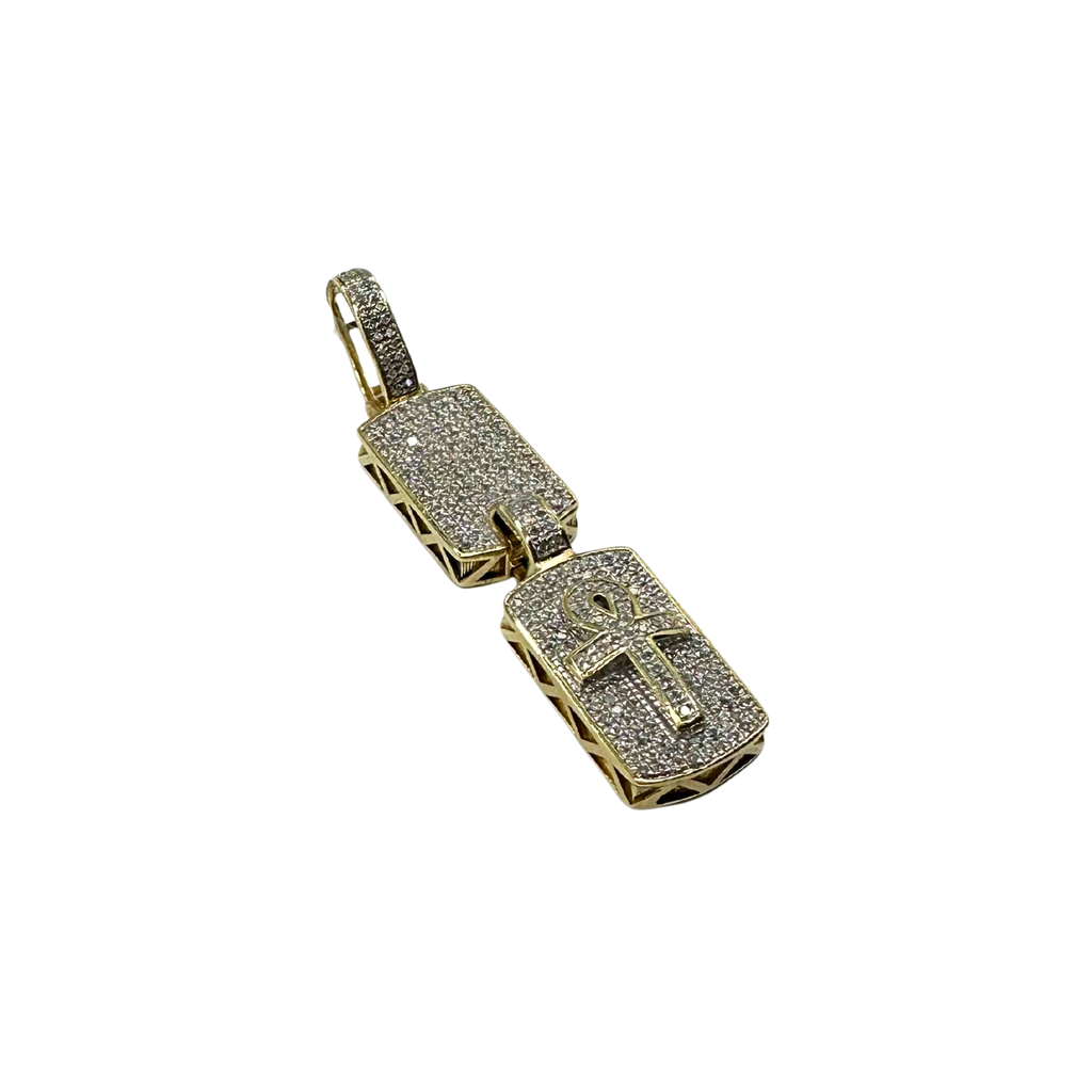 Gold pendant with diamond accents on a white background