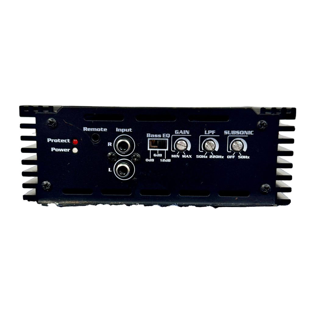 SKAR AUDIO RP-1200.1D 1200 Watt Class D Monoblock Car Amplifier Black amplifier on a blue carpet with a white wall in the background