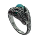 JAI .925 Sterling Silver/14K Gold Turquoise and Emerald Snake Wrap Ring Silver snake head ring with turquoise stone on a white background
