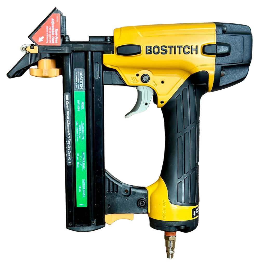 BOSTITCH 18-Gauge 1-1/2" Pneumatic Flooring Stapler w/ Hard Case (EHF1838K) Bostitch nail gun on a wooden surface