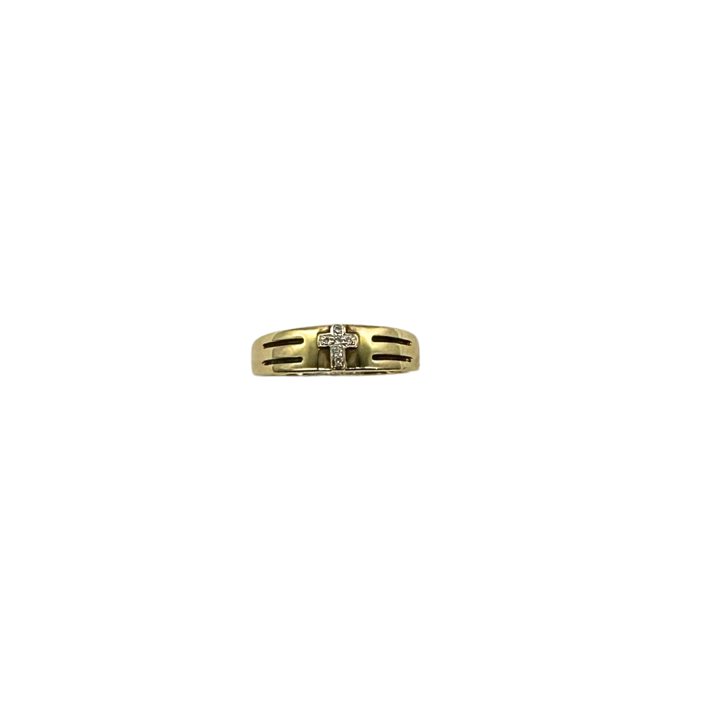 Gold ring with a cross design on a white background