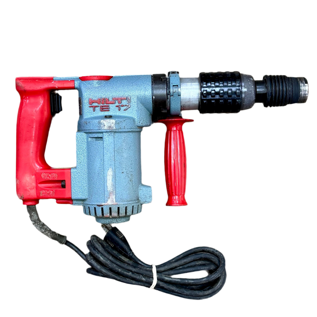 Red and black electric drill on a white background