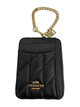 Black Coach wallet with gold chain on a white background
