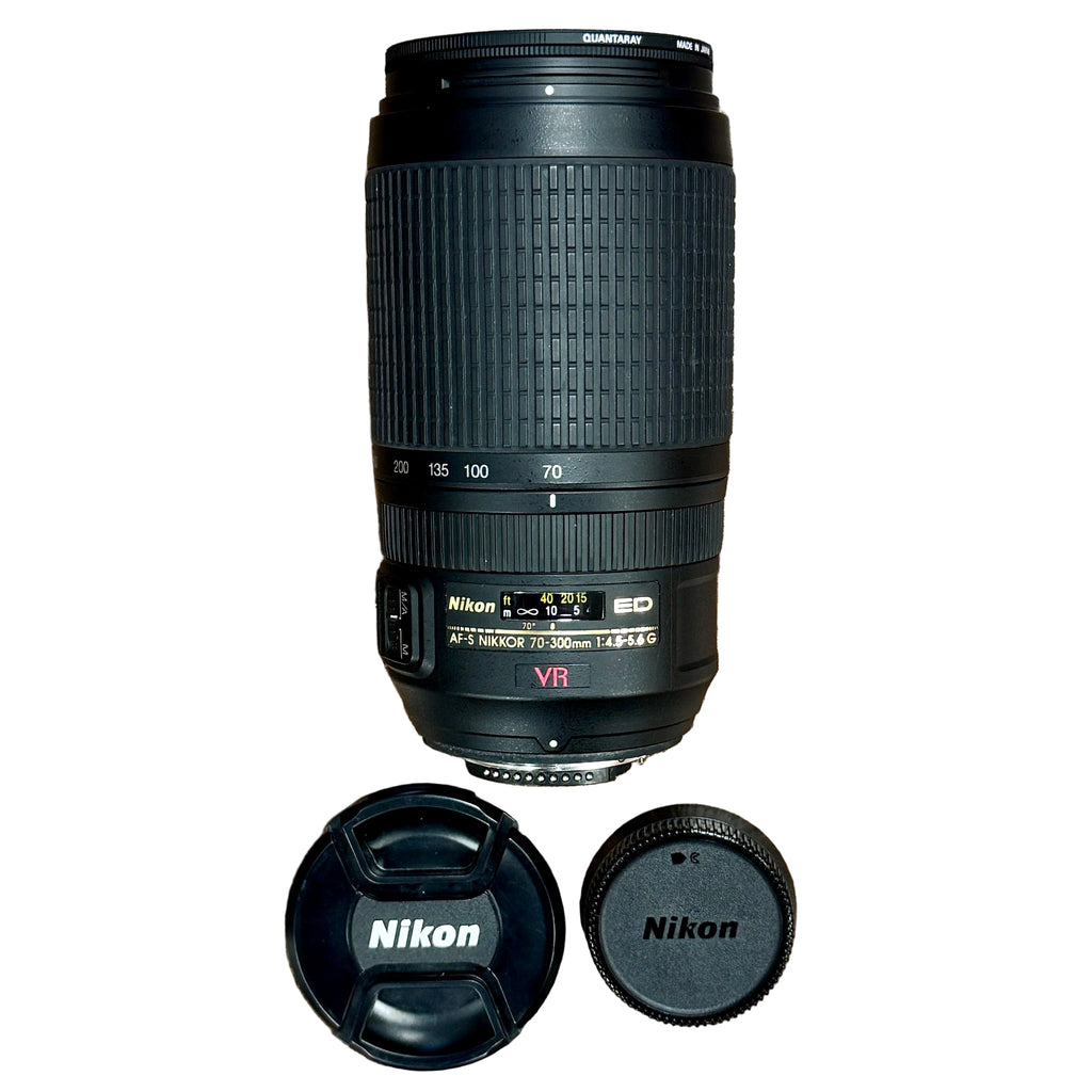 Nikon AF-S VR NIKKOR 70-300mm f/4.5-5.6G IF ED Zoom Camera Lens w/ Front & Rear Caps Nikon camera lens with lens cap and body cap on a white background