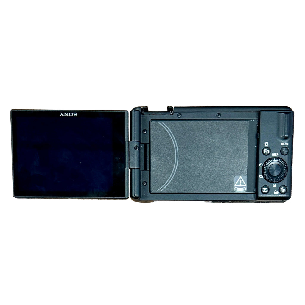 Sony ZV-1F Vlog Camera for Content Creators and Vloggers - Black Camera screen and rear panel on a wooden surface