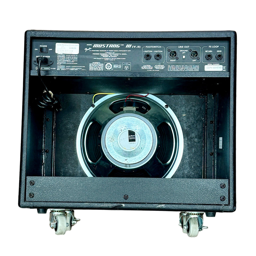 Fender MUSTANG III V.2 Modeling Guitar Combo Amplifier Black audio equipment on a wooden floor with a person's feet visible