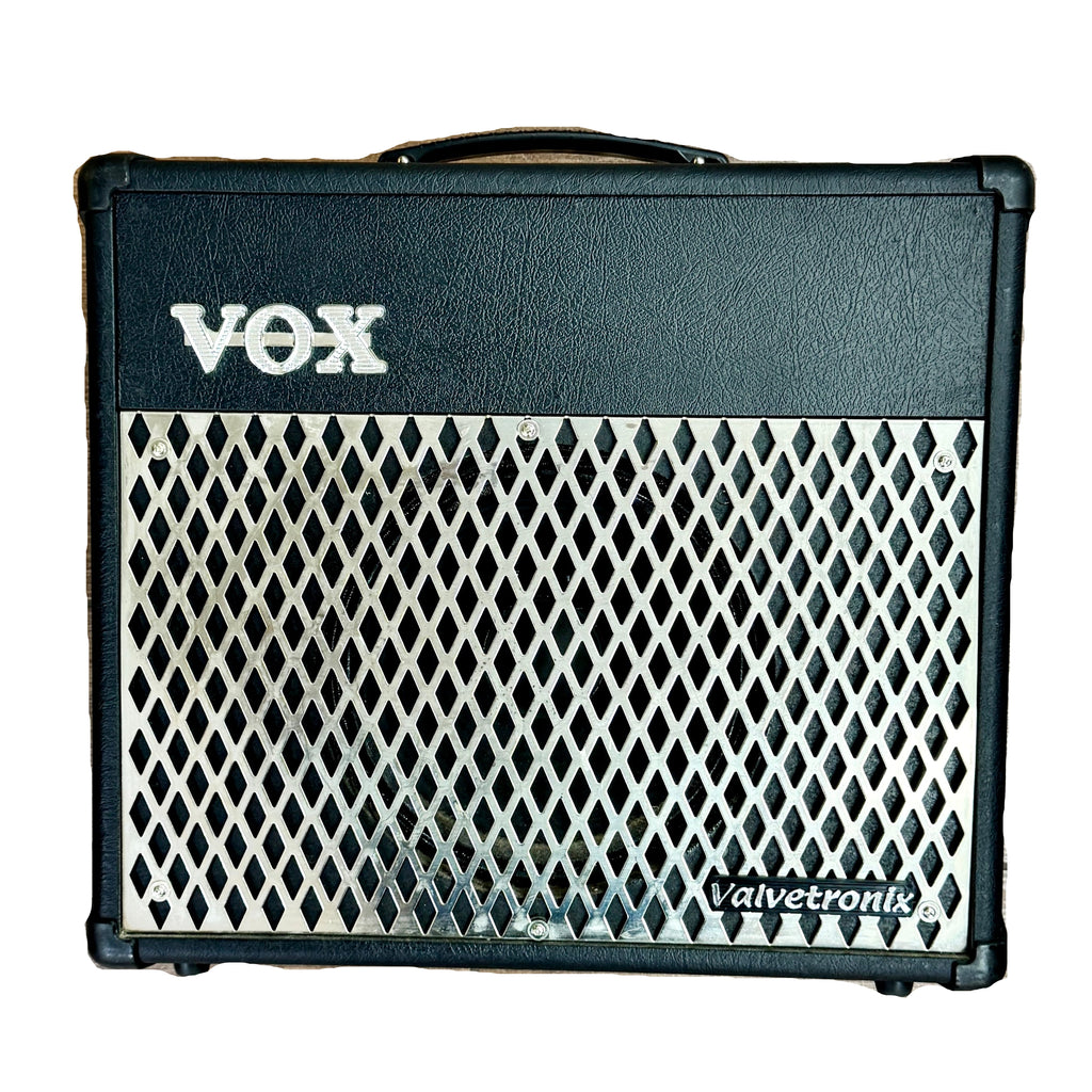 VOX Valvetronix VT30 Guitar Combo Amplifier VOX Valvetronix guitar amplifier on a wooden surface