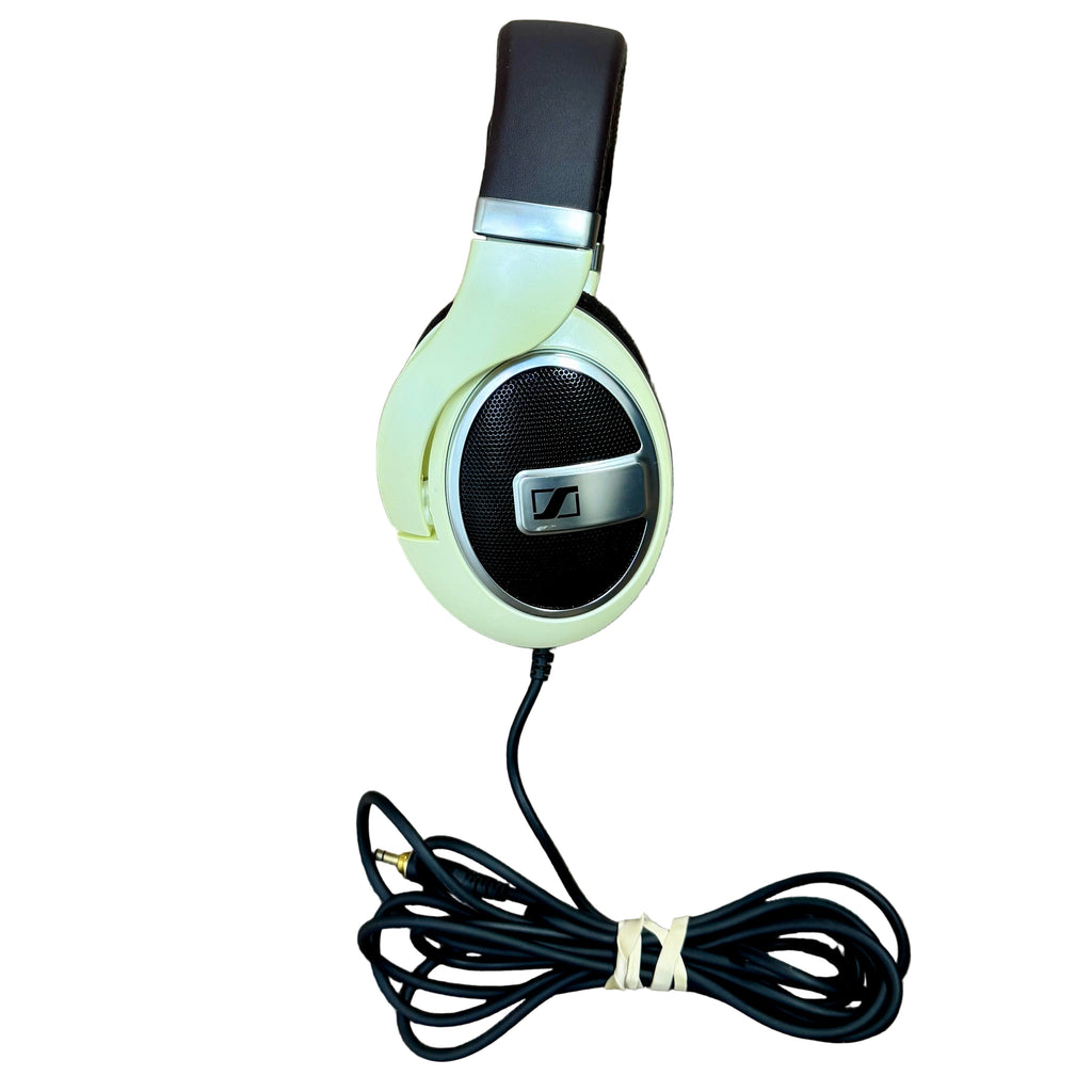 Sennheiser HD 599 Open-Back Over-Ear Audiophile Headphones - Ivory Sennheiser headphones with a visible brand logo on a white background