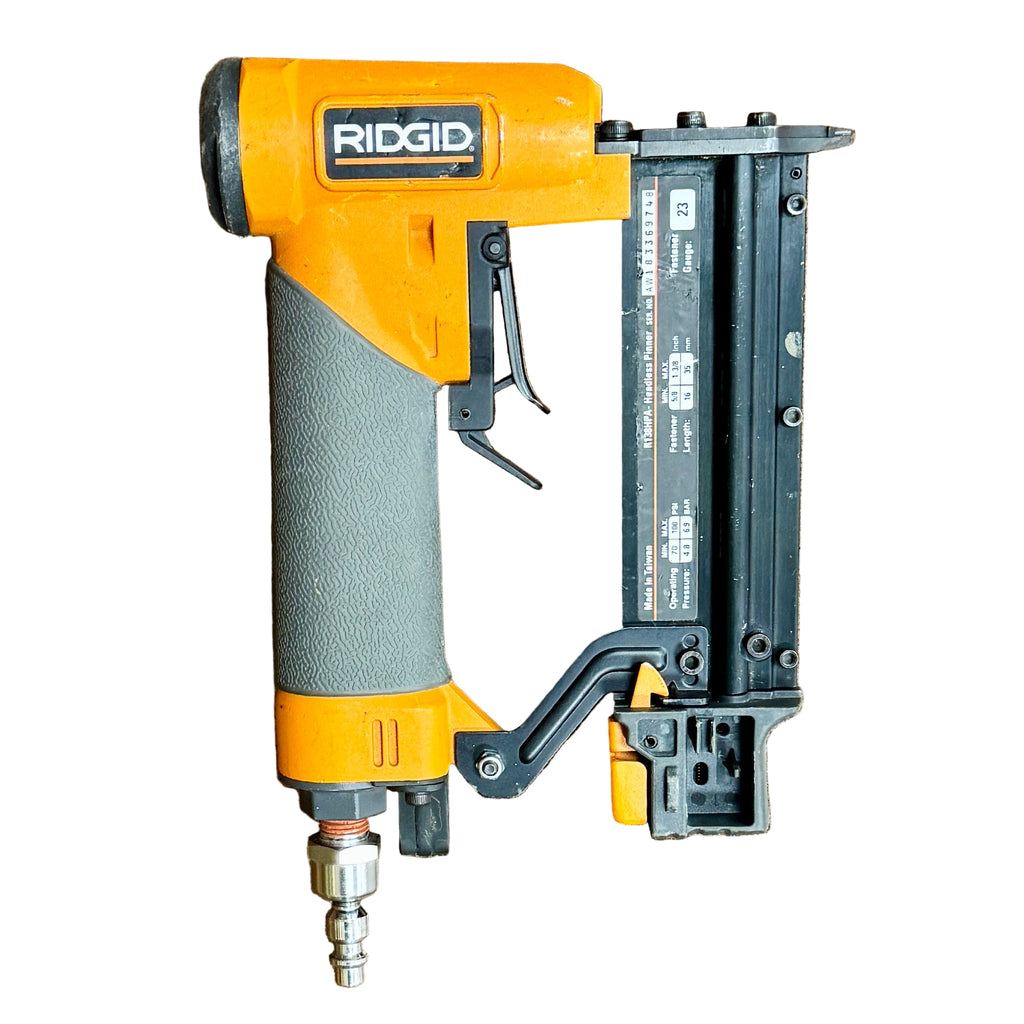 RIDGID 23-Gauge 1-3/8" Pneumatic Headless Pin Nailer (R138HPA) Ridgid nail gun on a wooden surface