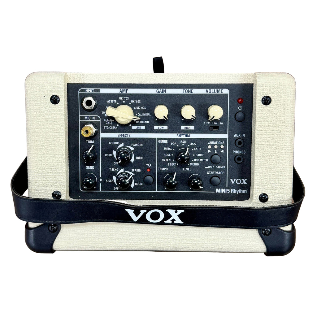 VOX MINI5 Rhythm Modeling Guitar Amplifier (MINI5-RM) VOX amplifier on a wooden surface