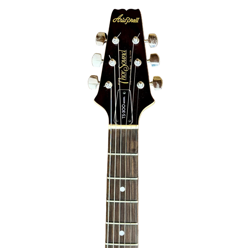 Aria Pro II Thor Sound TS-300 Electric Guitar w/ Hard Case Guitar headstock with brand name on a white background