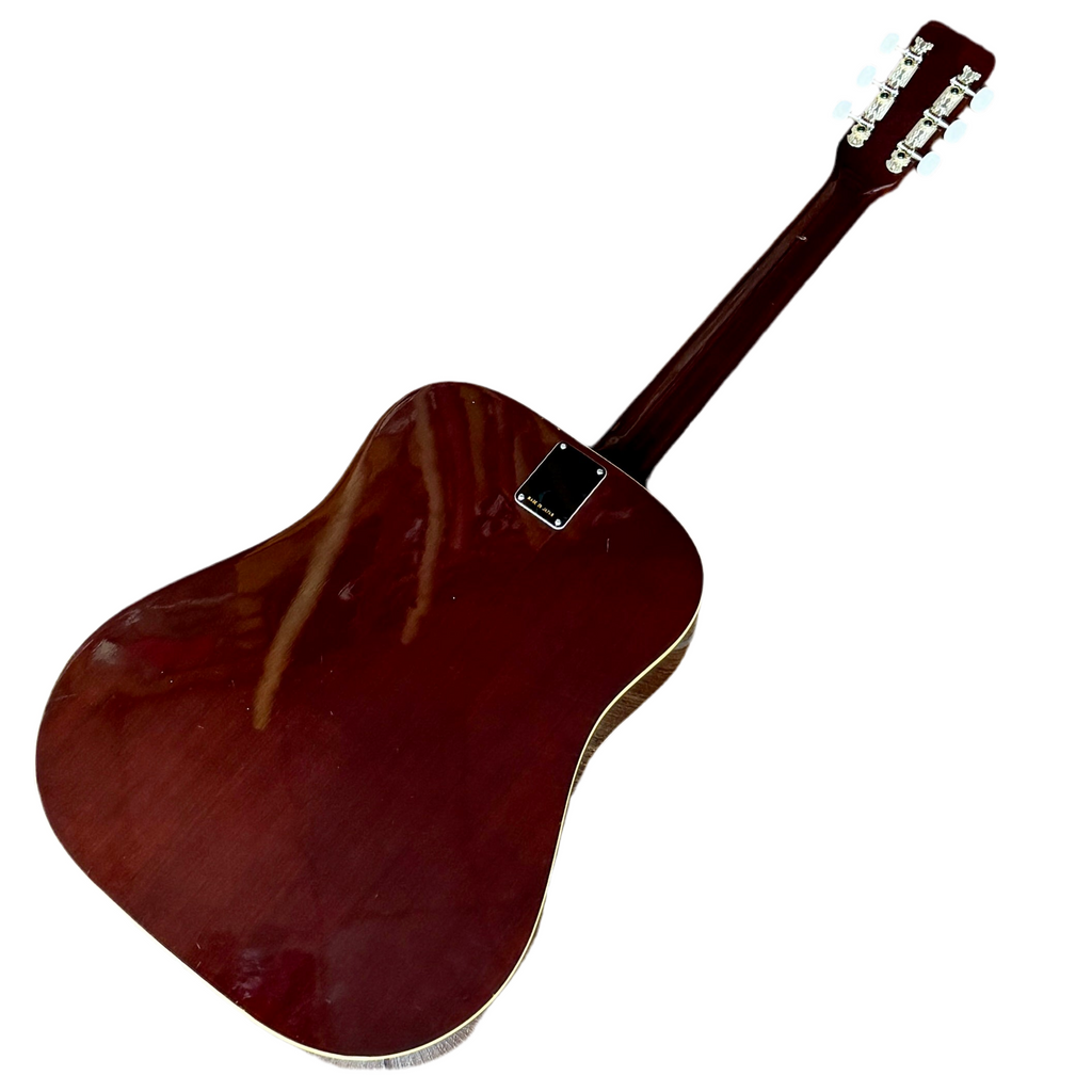 Angelica 6710 Acoustic Guitar Acoustic guitar with a dark brown finish on a white background