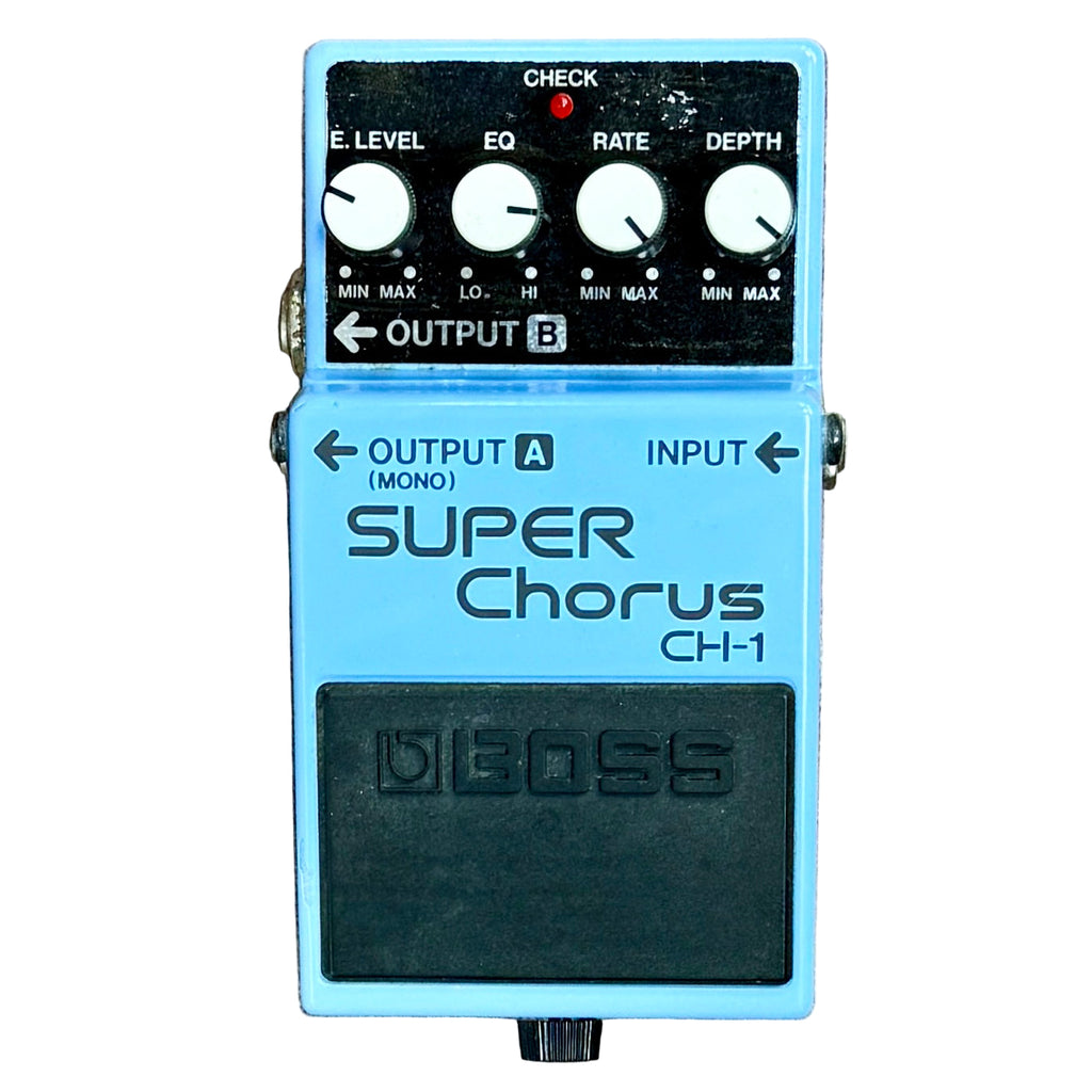 BOSS CH-1 SUPER Chorus Guitar Effects Pedal Boss Super Chorus CH-1 guitar effects pedal on a wooden surface
